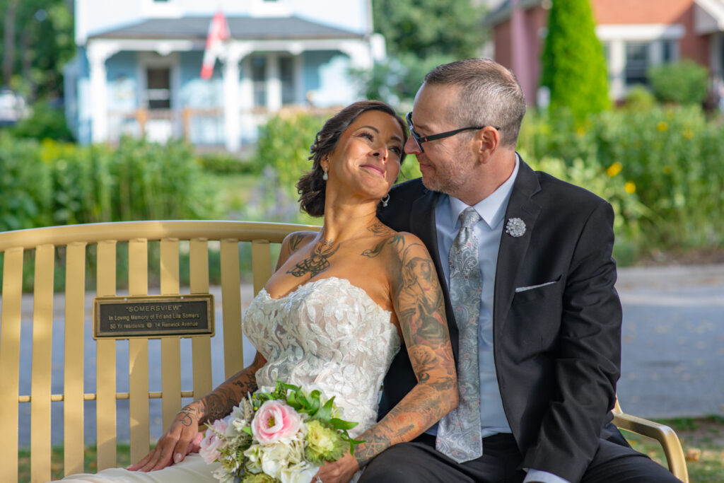 Wedding couple sitting romantically at table